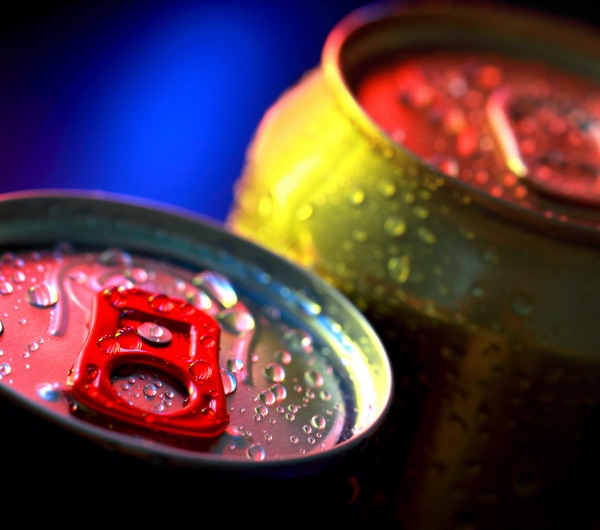 aluminum cans with red pop tabs