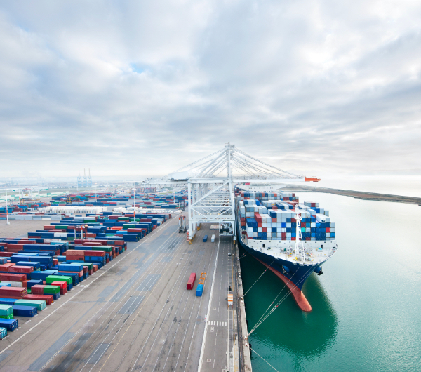 Shipping Containers on Boat in Port