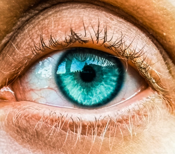 close up of blue human eye